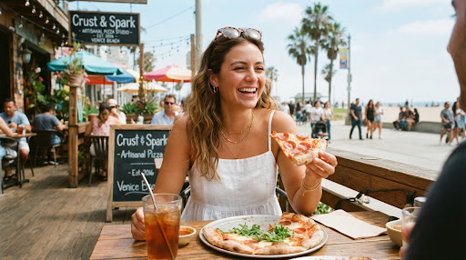 Portrait of a smiling young woman with sunglasses in Venice Beach enjoying lunch, natural bright daylight, retro film color tone